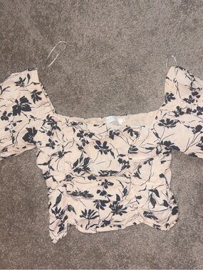 Astr Cream Floral Smocked Off-Shoulder Crop Top with Black Print